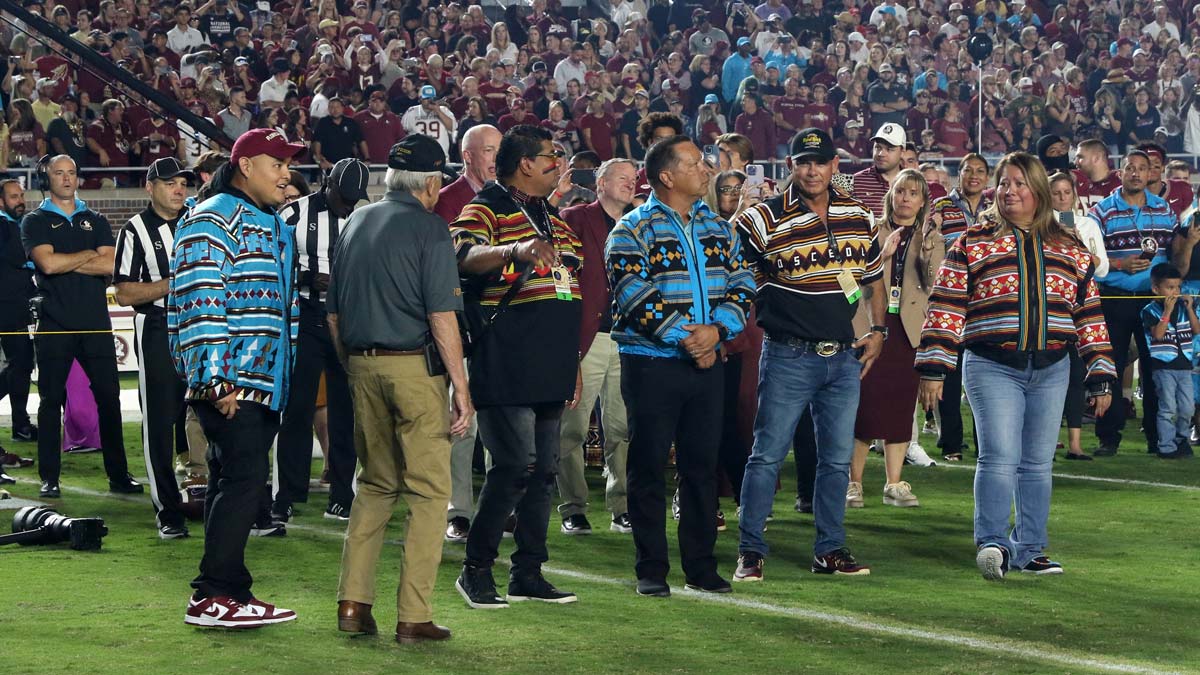 "Seminole Tribe of Florida Tribal Council members at 2023 Homecoming game"
