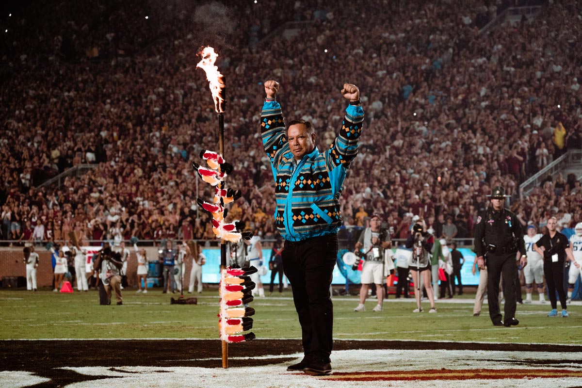 Seminole Tribe of Florida Chairman Marcellus W. Osceola Jr. planting the spear at midfield Oct. 21, 2023