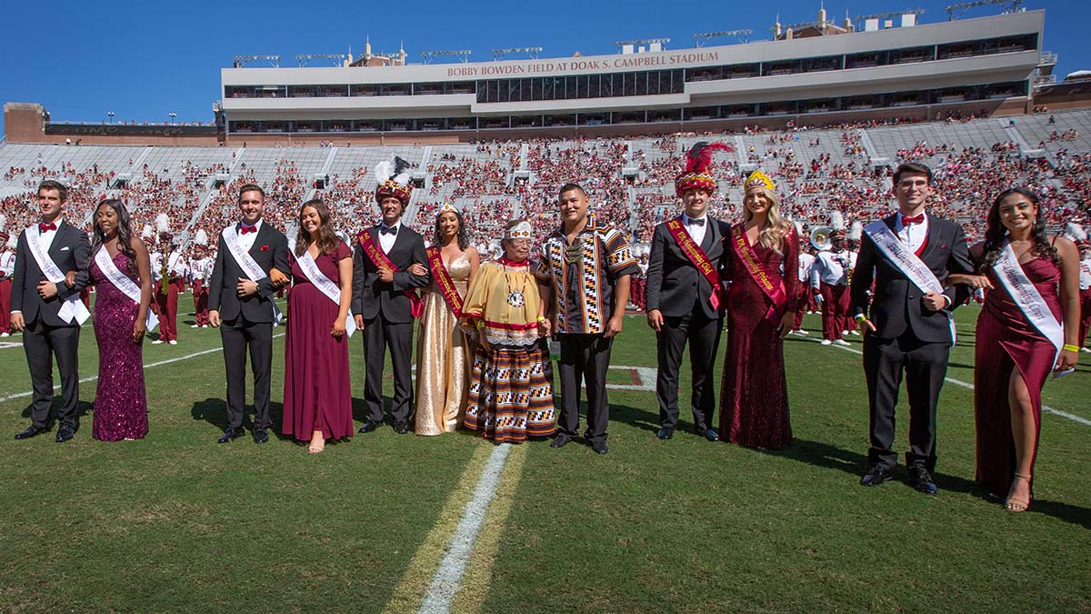 Miss Florida Seminole, her family members, and elected tribal officials in FSU’s homecoming
