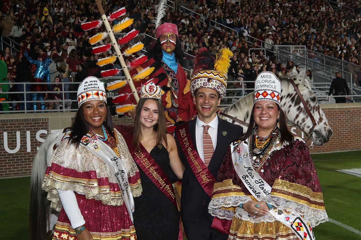 Seminole royalty with FSU Homecoming Chief and Princess at ceremony