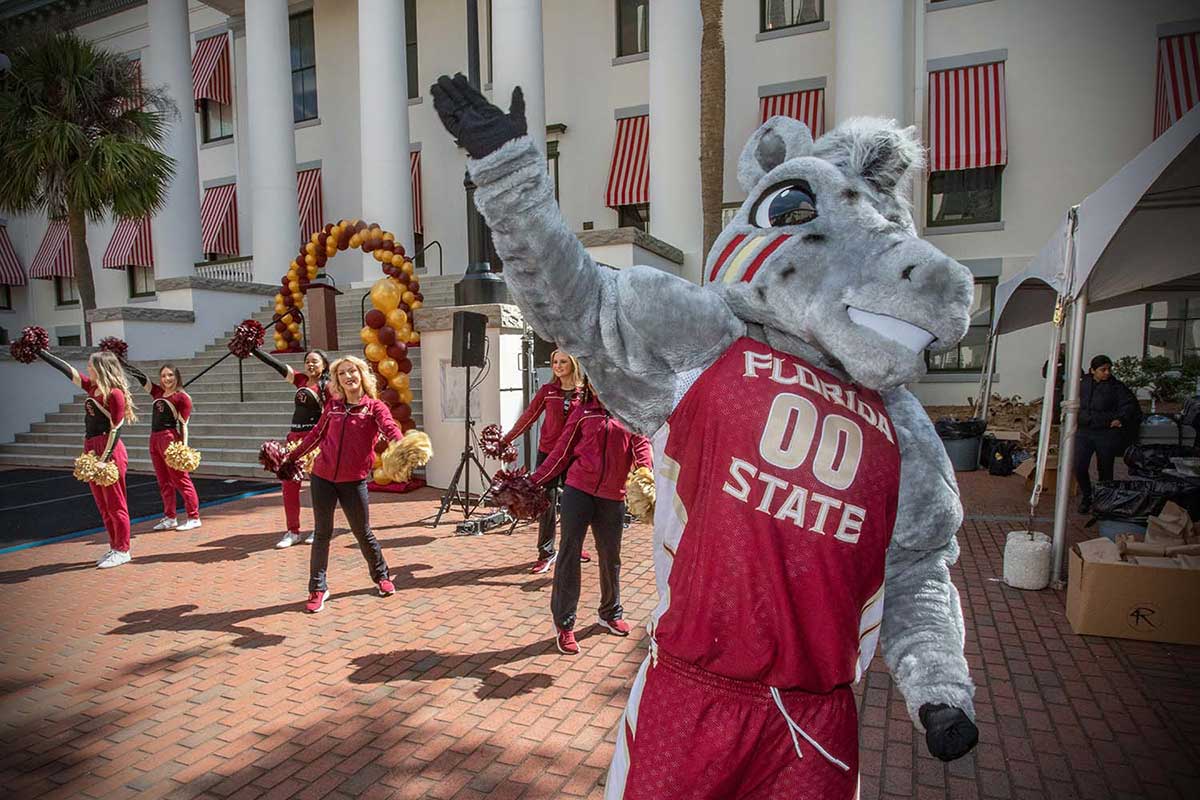 Cimarron mascot interacting with FSU fans at event