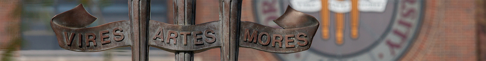 Image of FSU torches featuring the motto Vires, Artes, Mores